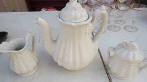 lot 24 image: red cliff iron stone tea pot with creamer sugar and bowls