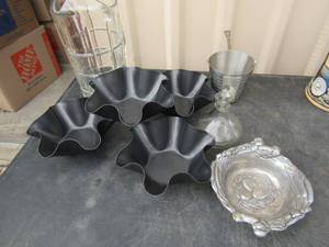 lot 42 image: kitchen lot includes, glass picture, bunt pans, measuring cups and more