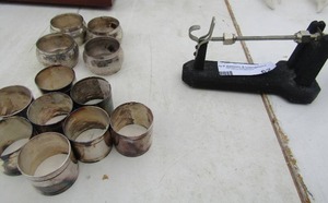 lot 62 image: 2 SETS OF SILVER PLATED Napkin ring holders,   & A  SCALE