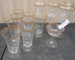 lot 85 image: gold top rim and bottom design tea glasses, wine glasses