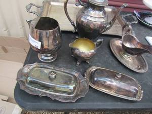 lot 92 image: 2 Oneida silverplated covered butter dishes, handled wringers silverplate tea pot, ROGERS gravy boat, creamer ( TRAY NOT INCLUDED)