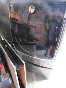 lot 103 image: LG WASHER  wash steam cycle also has bonus small wash in lower drawer matches #102 14 cycles, works great