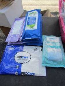 lot 129 image: medical lot, shampoo caps,adult wipes, barrier cream clothes,box of infinity feeding pumps new
