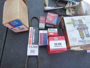 lot 148 image: fuel pump, brake parts, distributor cap, automotive v-belt and more
