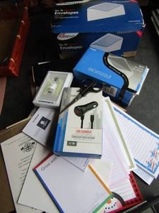lot 191 image: office lot includes envolopes, night light,car phone charger, mini alrm desk clock, multiple used note pads