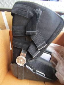 lot 200 image: medical boot size medium, 5 pairs of size 6 womens shoes