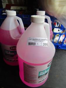 lot 209 image: 3 bottles of rv & marine antifreeze 1 bottle is half used