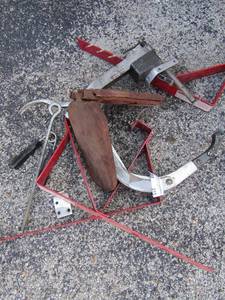 lot 215 image: 3 red brackets, large clamp, vintage tail light
