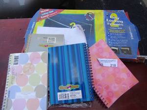 lot 218 image: easy locking filingn frames for file cabinet, various nite padsbooks, opeded pack of notebook paper
