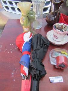 lot 219 image: flower vases red basket, 2 umbrellas, solor dancing sunflower,