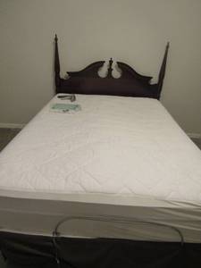 lot 232 image: Bassett headboard with metal frame queen size