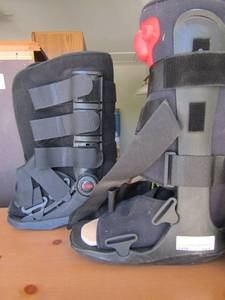 lot 241 image: 2 one size fits all  MEDICAL black foot boots used