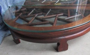 lot 253 image: Oval floor glass table 2 piece glass top size is 30 DIAMETER   6 HEIGHT  lot 2 set on it originally