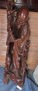 lot 2 image: WISDOM BUDDHA  SOLID WOOD stands about 38 HT  11 D  approx