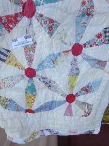 lot 260 image: queen size handmade quilt, light colors and floral