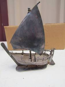lot 277 image: silver platted boat on stand