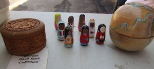 lot 295 image: Siberian burch bark hand carved wooden trinket,  oval wooden ball inside contains 7 little wooden indian women