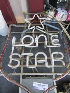 lot 297 image: Lone star beer light has a small crack in the light.