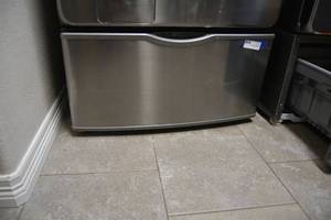 lot 8 image: Samsung Laundry Pedestal with Storage Drawer and Cleaners