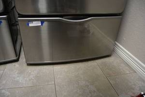 lot 9 image: Samsung Laundry Pedestal with Storage Drawer and Cleaners