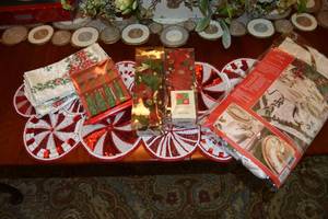 lot 132 image: Christmas Dining Tablecloth 60x120, Beaded Candy Table Runner, Poinsettia Napkin Rings, and Holly Spreaders