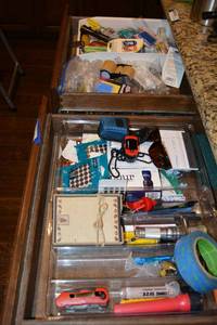 lot 171 image: 2 Drawer Contents Finger Heart Monitor, Flashlights, Notepaper, Birthday Candles and More