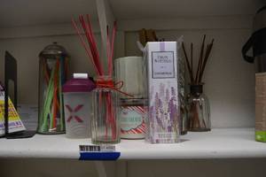lot 205 image: Fragrance Diffusers, Candles, and Straw Container