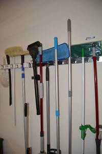 lot 352 image: Storage Bar for Mops and Cleaners