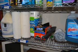 lot 359 image: Trash Bags, Windex, Paper Towels, Gallon of Lotion
