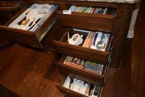 lot 168 image: Contents of 5 Drawers Spatulas, Cheese Grater, Knives, Measuring Cups and Spoons