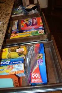 lot 184 image: Plastic Kitchen Wrap, Storage Bags, Straws, and Hand Mixer