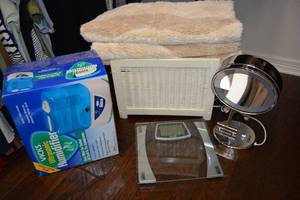lot 299 image: Bathroom Rugs, Wicker Magazine Rack, Vicks Humidifier, Scale and Conair Mirror
