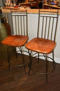 lot 140 image: Pair of Wrought Iron Swivel Bar Stools
