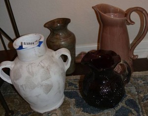 lot 144 image: Decorative Vases and Pitcher Purple Grape Pitcher by Mosser Glass, White Painted Pottery Vase, and More