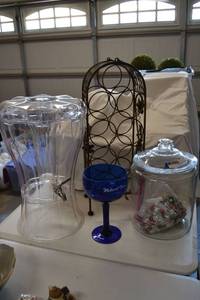lot 374 image: Glass Cannister with Glass Gems, Plastic Drink Dispenser, Giant Blue Goblet, Wire Wine Stand