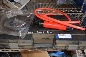 lot 410 image: Hitch box and Siphon Hand Pump