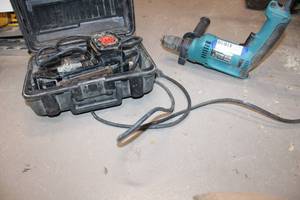 lot 548 image: Makita HP1621 Concrete Hammer Drill and Belt Sander
