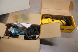 lot 558 image: Makita and DeWalt Angle Grinders