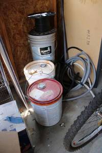 lot 671 image: Exterior Paint and Wire Spool