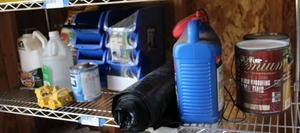 lot 676 image: Blue Tray Sets, Fertilizer, Wood Stain, Ant Killer, Plastic Sheeting