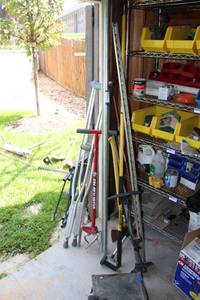 lot 679 image: Crutches, Air Pump, Tree Pruner, Axe