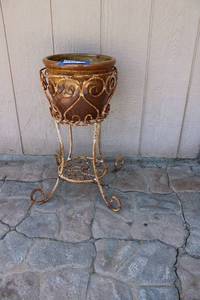 lot 479 image: Metal Flower Pot Holder with Glazed Pot