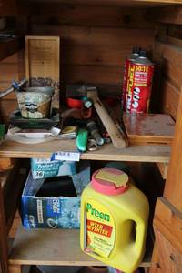 lot 458 image: Trash Bags, Preen Weed Preventer, TruFuel Cans, and Tools