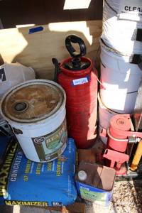 lot 696 image: 5 Gallon Metal Red Lawn and Garden Sprayer