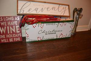 lot 92 image: Christmas Dcor Heavenly Peace Sign, Wine Sign, Angel Votive Holder, Crochet Style Stockings, Kirklands Candle and Greenery Arrangement