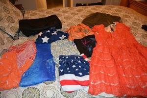 lot 94 image: Swim Trunks (Size 14), Sun Dress (Size M), and Swimsuit Covers Plus Black Bags