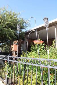 lot 699 image: Garden Feeder Stakes and Rain Gauge, see pictures