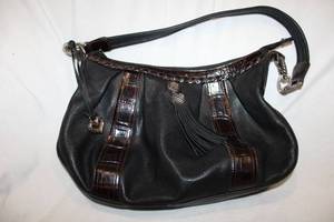 lot 725 image: Purses Black Purse with Brown Patent Trim and Front Tassel marked Brighton