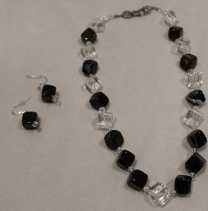 lot 740 image: Jewelry Sterling Silver (marked 925) Acrylic black and white tuxedo necklace and matching earrings