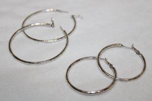 lot 743 image: Jewelry (2) pairs of hoop earrings no markings (Likely Brighton earring charm hoops)